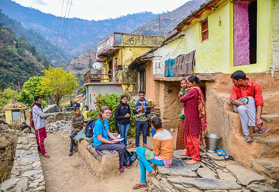 Krithika and team speaking to locals in India